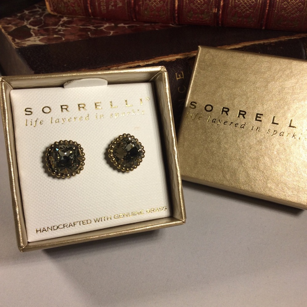 Sorrelli grey crystal and gold tone earrings.
